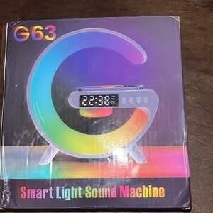 Bluetooth speaker, radio, charger. G63 SMART LIGHT SOUND MACHINE. New.